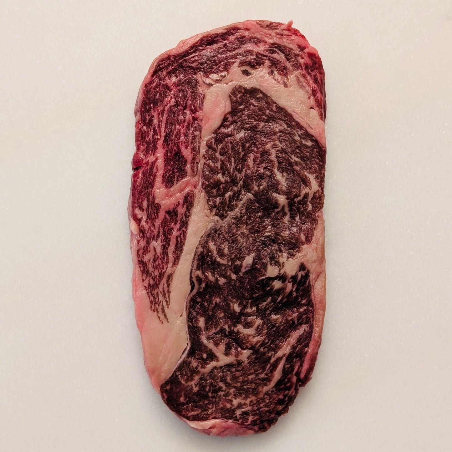 Halal Wagyu Ribeye Raw photo, with a BMS rating of 6/7