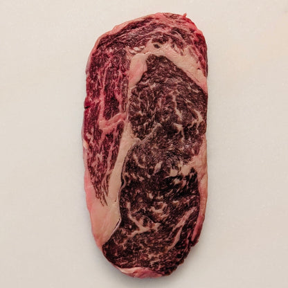Halal Wagyu Ribeye Raw photo, with a BMS rating of 6/7